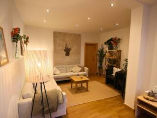 08. Catered chalet Alpensport Saalbach Hinterglemm Woonkamer